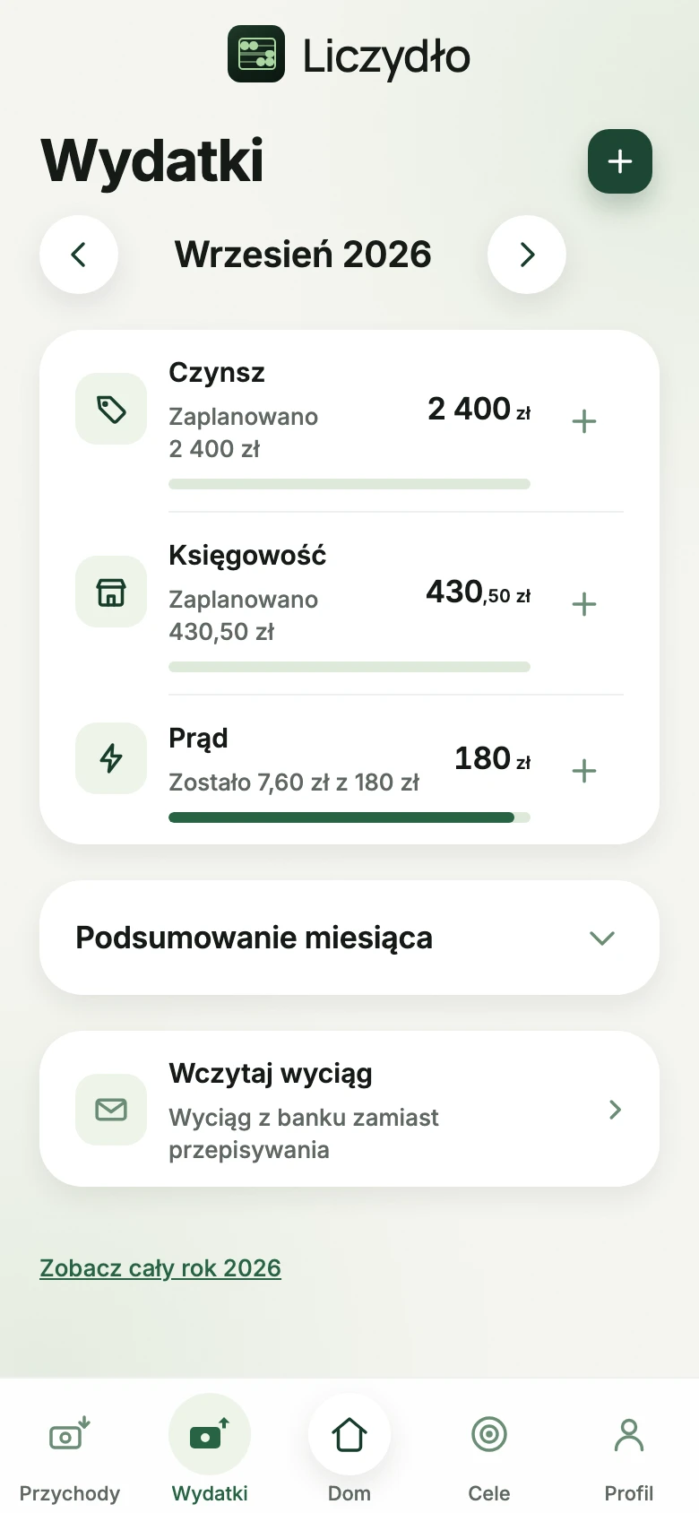 Ekran miesiąca w zakładce Wydatki: plan i wydane kwoty w kategoriach, koszt firmowy ze skutkiem podatkowym.